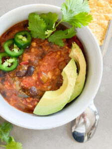 Qdoba Tortilla Soup Recipe with avocado and jalapeno peppers, cilantro