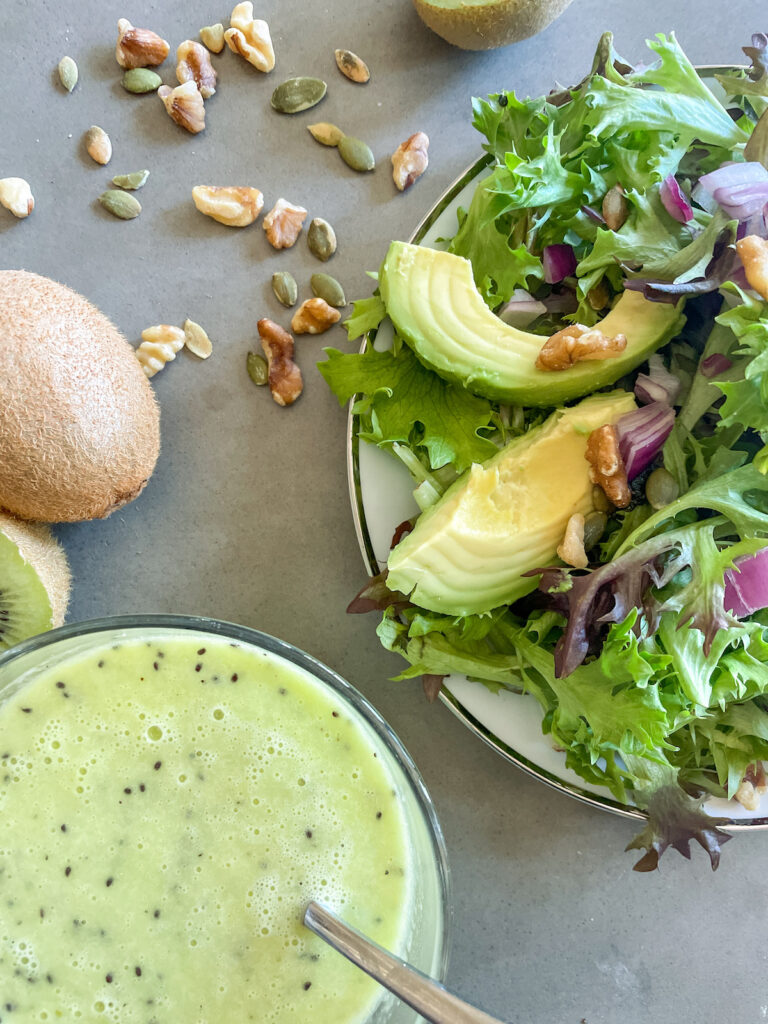 spring mix salad with walnuts and pepitas, kiwi vinaigrette salad dressing